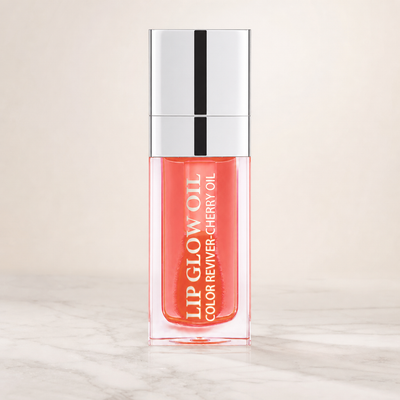 Dew Kiss tinted lip oil — neutral studio hero
