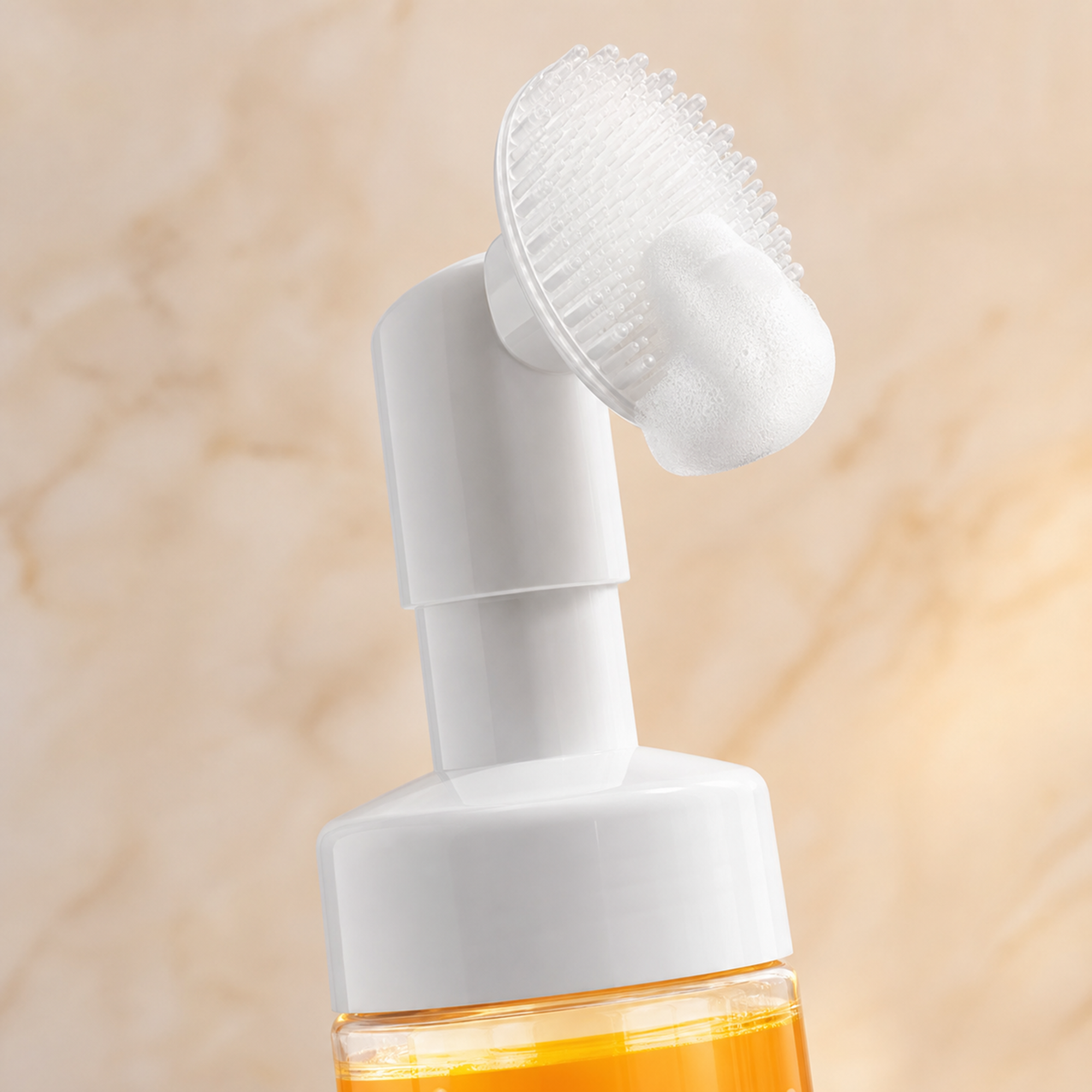 First Light silicone brush head with golden foam, close-up