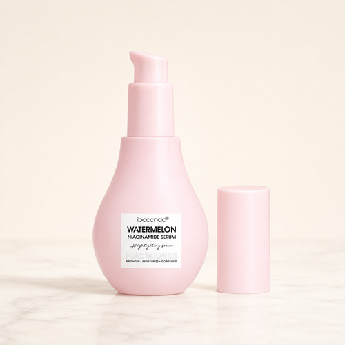 Gaia's Glow watermelon priming serum bottle — neutral studio