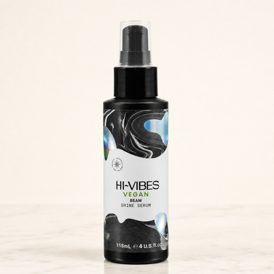 Liquid Silk shine hair serum bottle — neutral studio hero